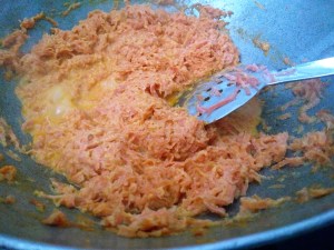 Milk maid added to grated carrot for carrot mousse