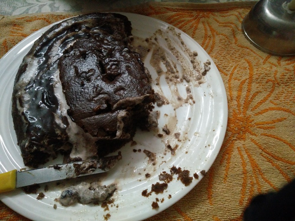 Chocolate cranberry cake with whipped cream